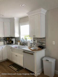 216 Eisenhower Avenue Seaside Heights, NJ 08751 - Photo 15 of 43 a kitchen with a sink and cabinets