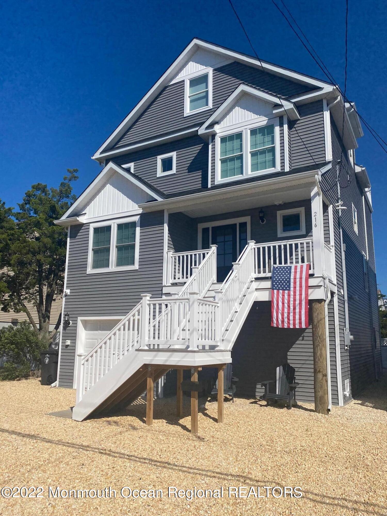 216 Eisenhower Avenue Seaside Heights, NJ 08751 - Photo 2 of 43 a front view of a house with a balcony