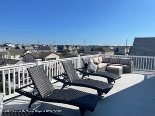 216 Eisenhower Avenue Seaside Heights, NJ 08751 - Photo 31 of 43 a view of a roof deck with couches