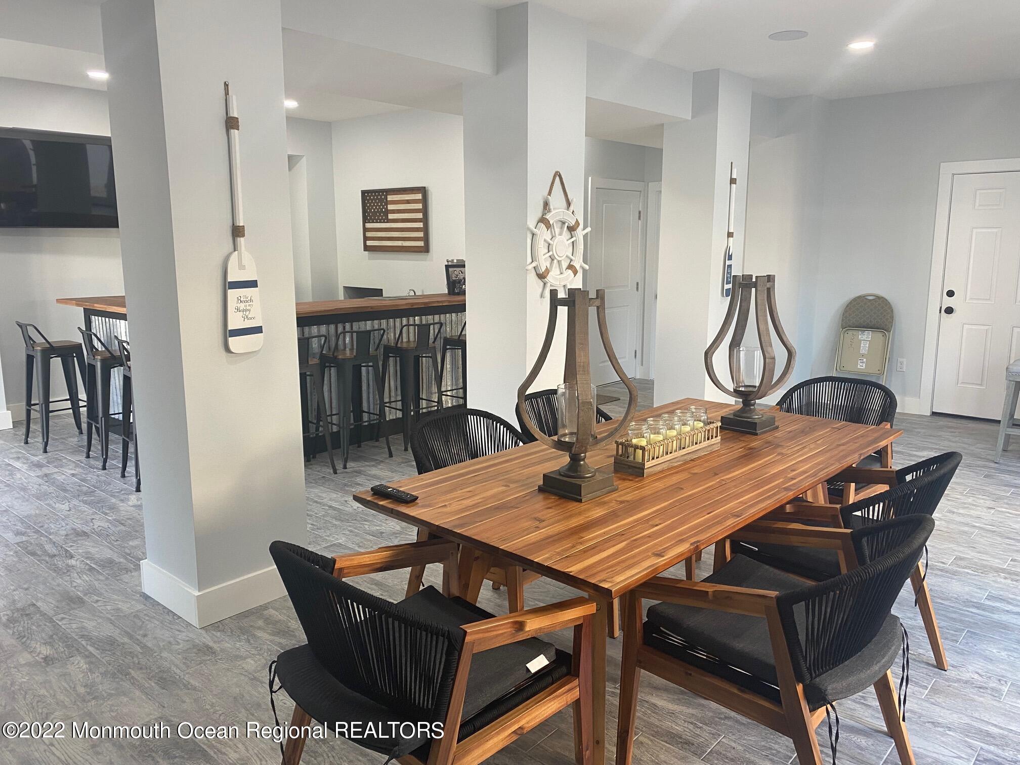 216 Eisenhower Avenue Seaside Heights, NJ 08751 - Photo 39 of 43 a view of a dining room with furniture