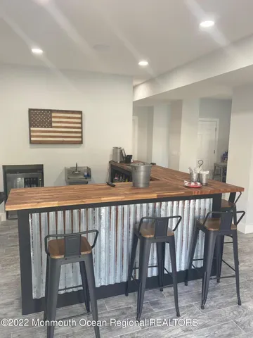 a view of a chairs and table in patio