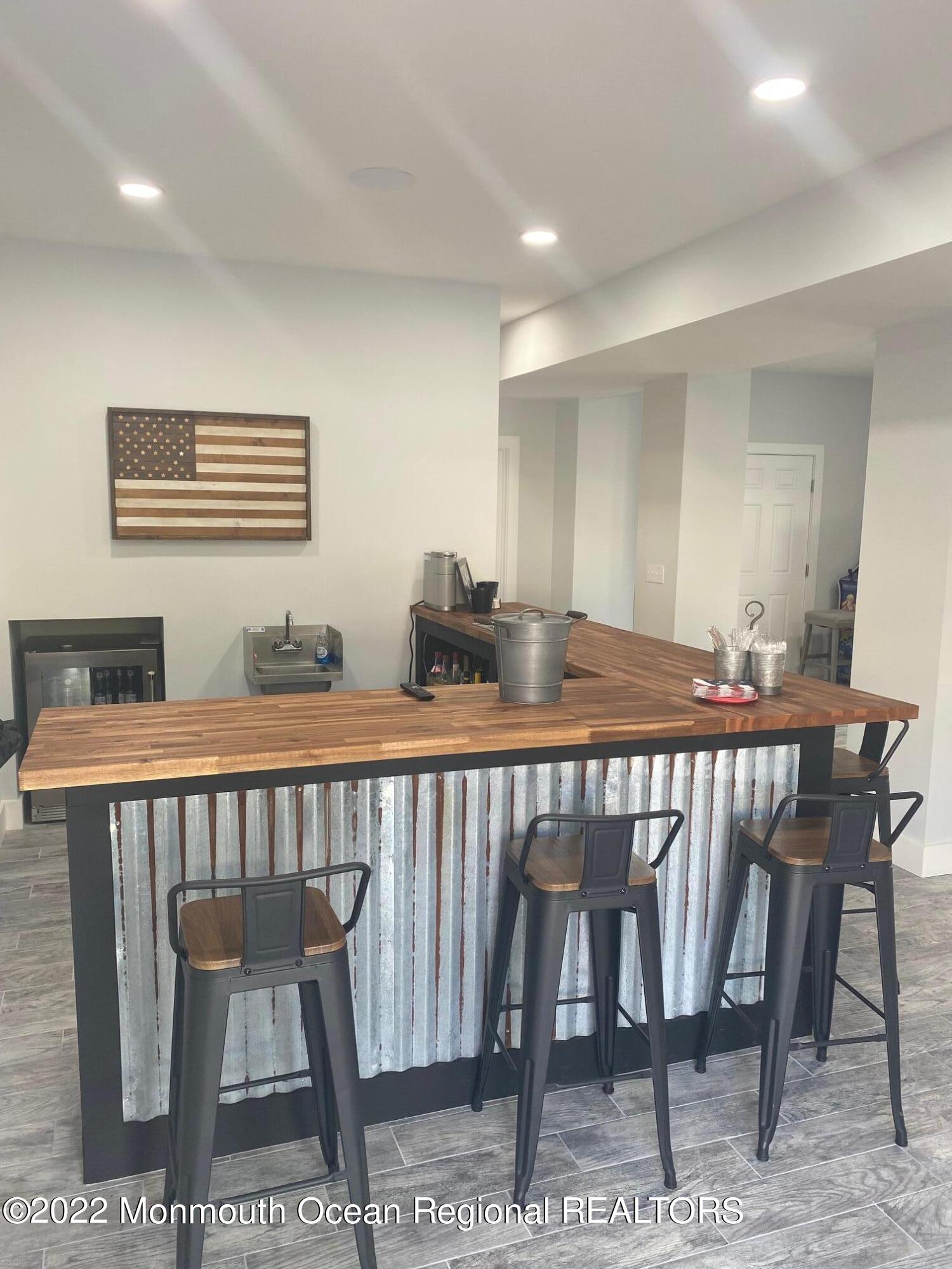 216 Eisenhower Avenue Seaside Heights, NJ 08751 - Photo 40 of 43 a view of dining room and hall