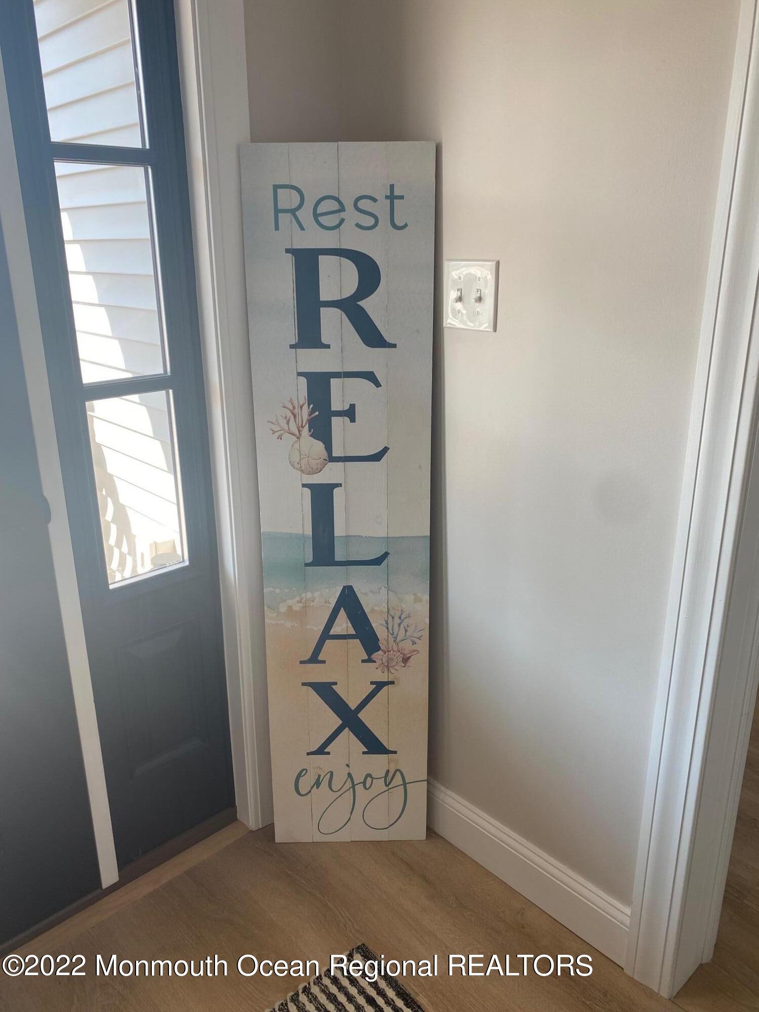 216 Eisenhower Avenue Seaside Heights, NJ 08751 - Photo 7 of 43 a view of a hallway with cabinets