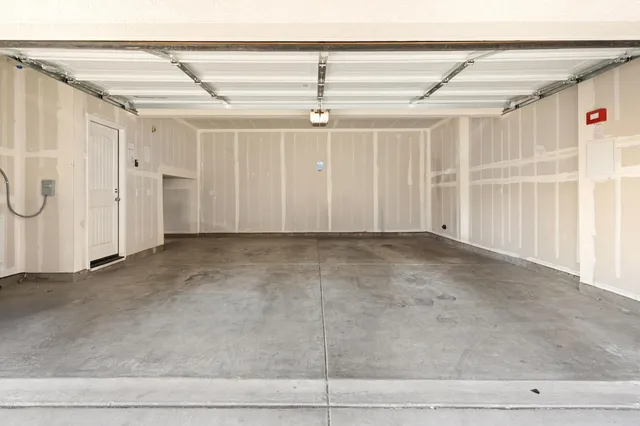 a view of a park with swings and slides