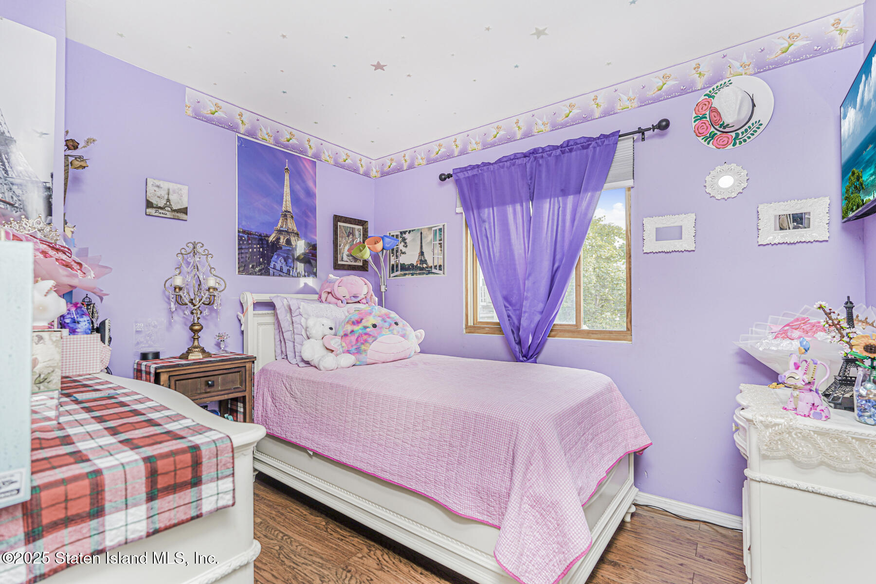 81 Selvin Loop, Unit A Staten Island, NY 10303 - Photo 16 of 25 a bedroom with a bed and a window