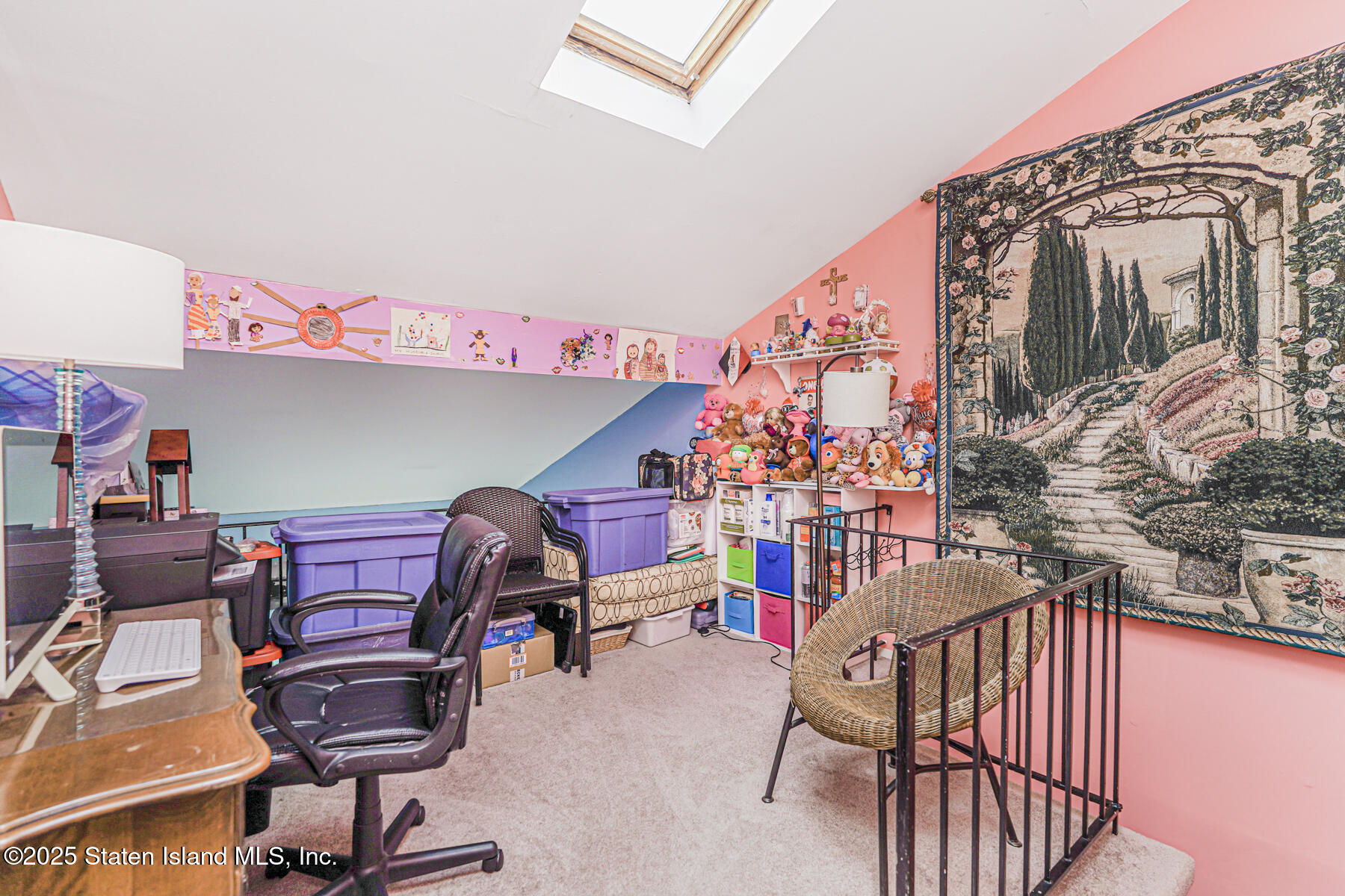 81 Selvin Loop, Unit A Staten Island, NY 10303 - Photo 18 of 25 a room with lots of white furniture and a chandelier