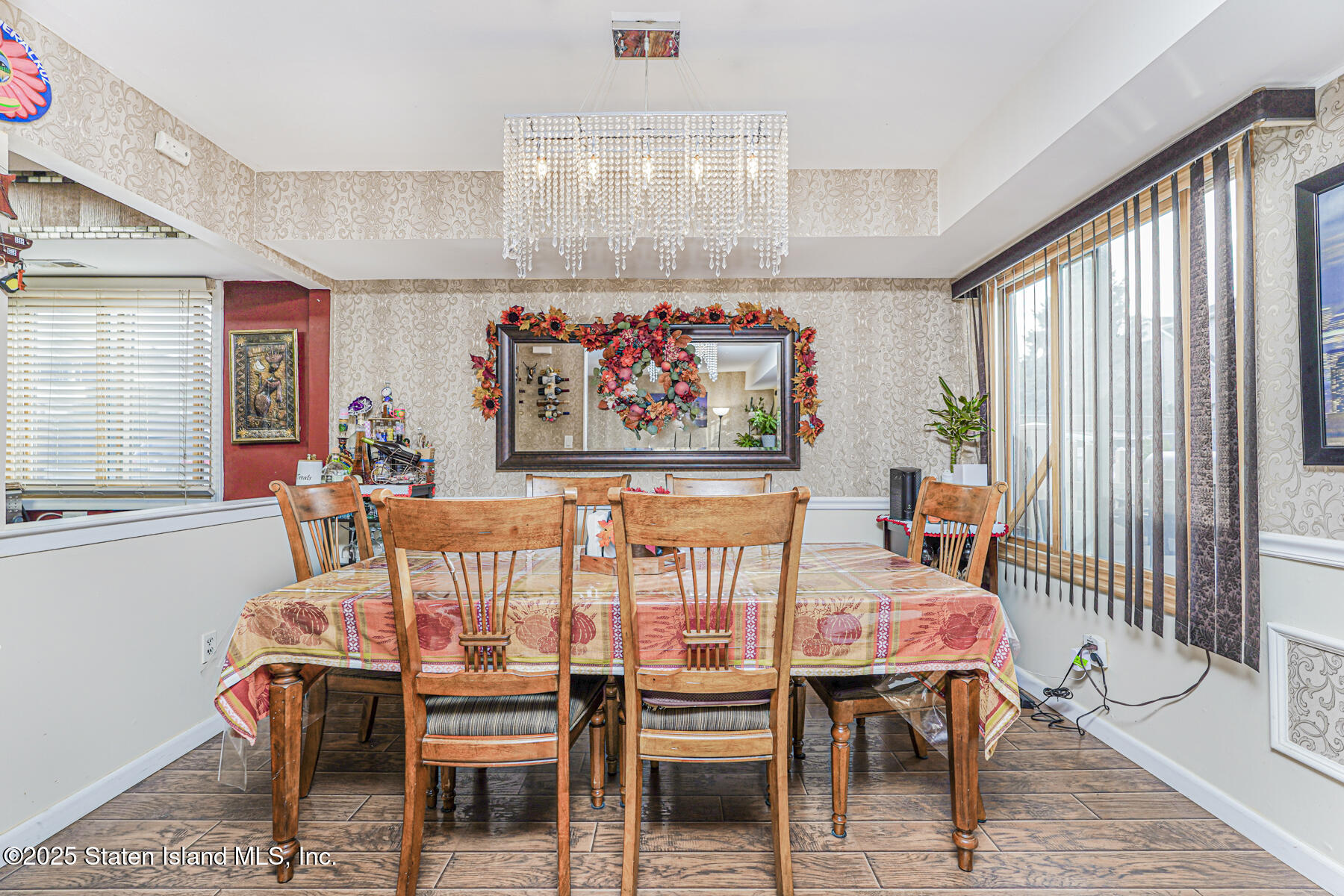 81 Selvin Loop, Unit A Staten Island, NY 10303 - Photo 8 of 25 a dining room with furniture a rug and wooden floor