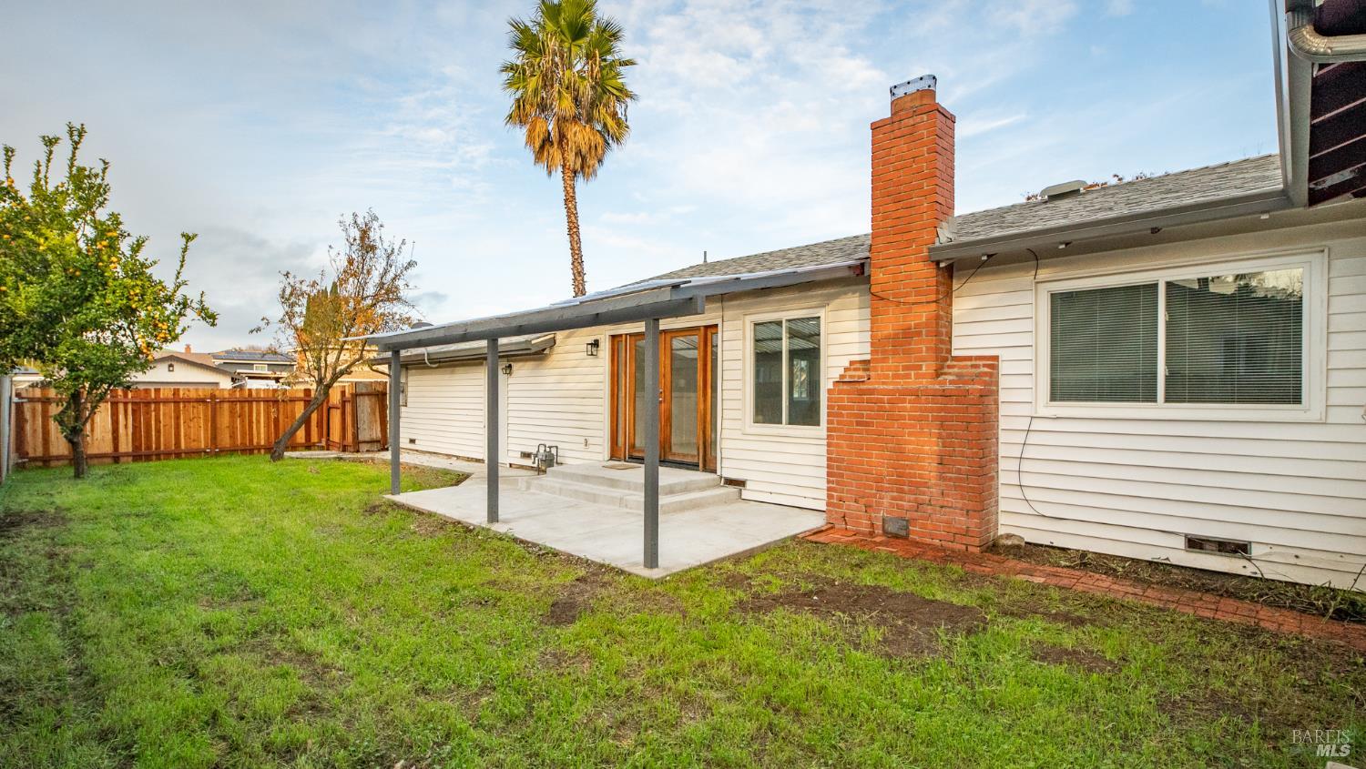 2611 Lilac Street Fairfield, CA 94533 - Photo 12 of 15 The yard is spacious and includes some fruit trees.