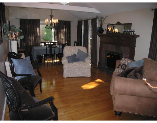 20 Benjamin Road Lexington, MA 02421 - Photo 8 of 24 a living room with furniture and a fireplace