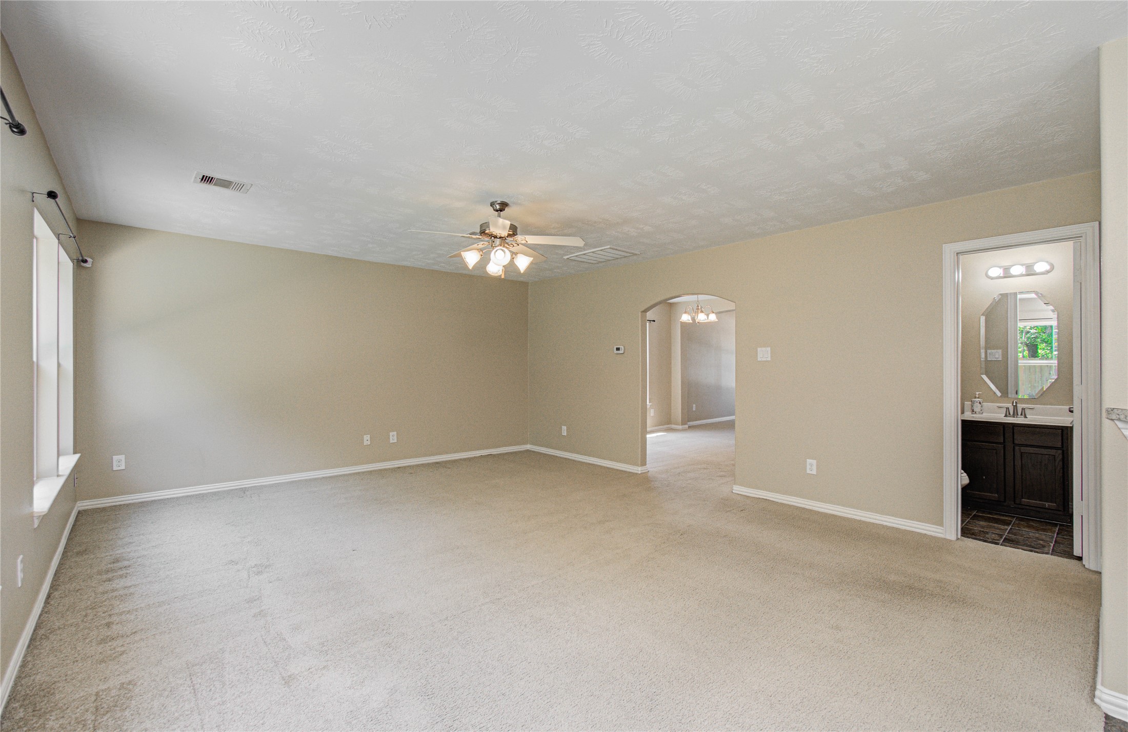 3414 Hunter's Canyon Baytown, TX 77521 - Photo 14 of 43 Living room with half bath off to the right.