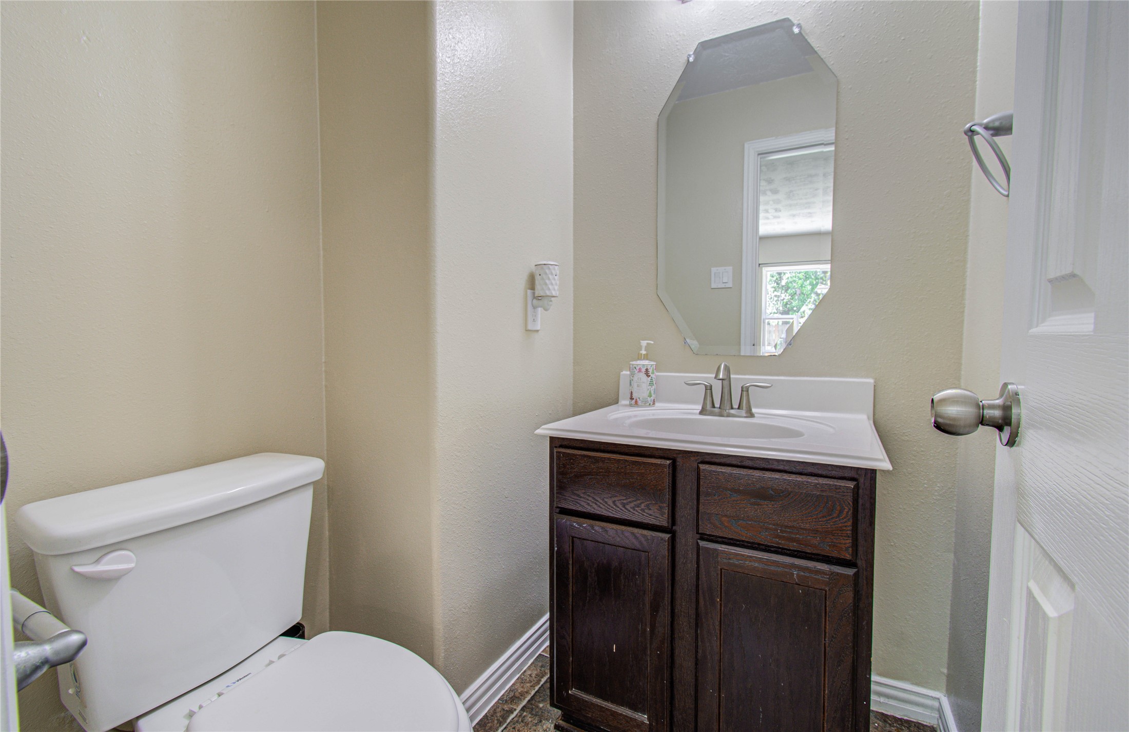 3414 Hunter's Canyon Baytown, TX 77521 - Photo 15 of 43 Half bathroom downstairs off of living area!