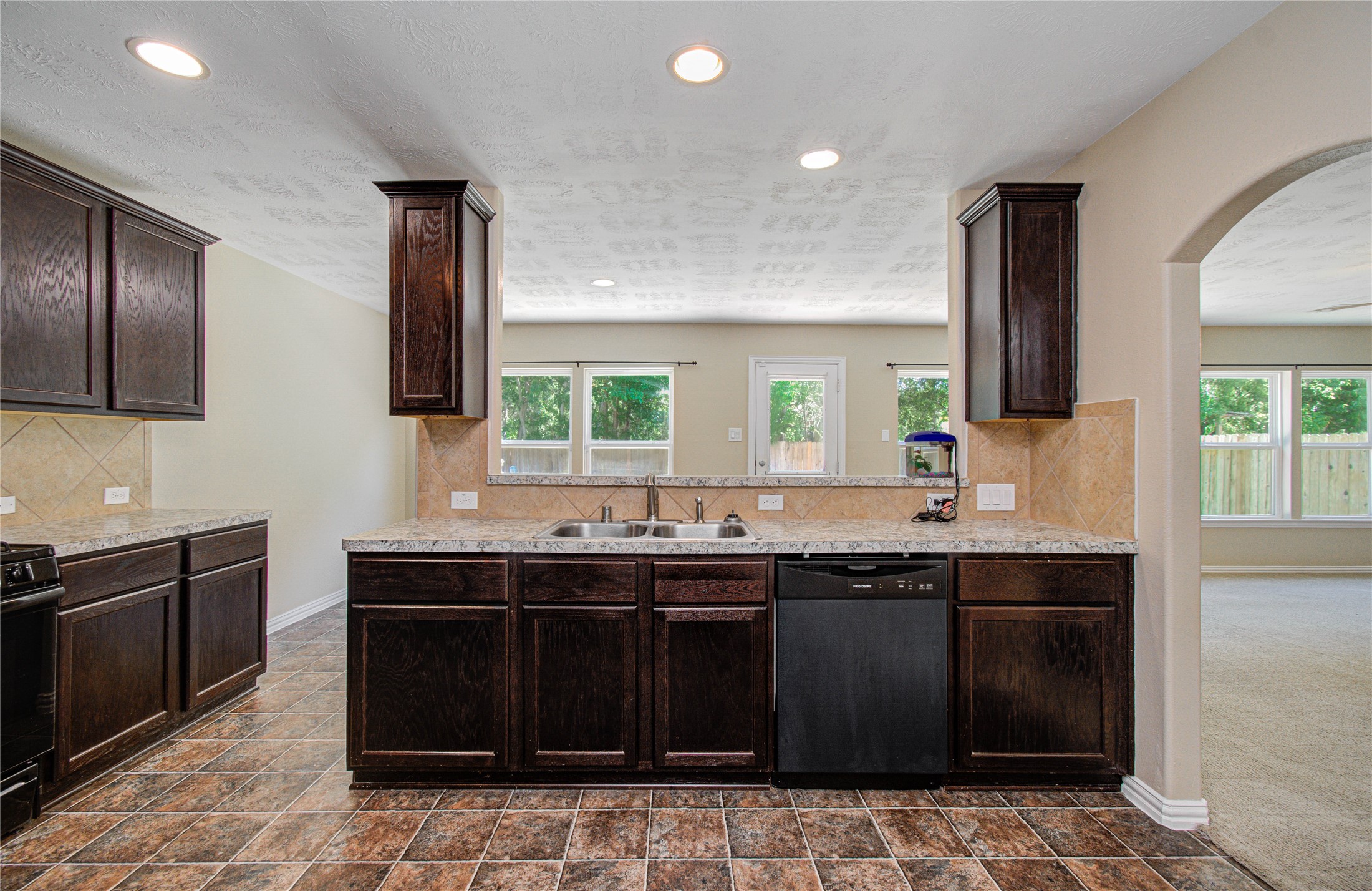 3414 Hunter's Canyon Baytown, TX 77521 - Photo 23 of 43 Kitchen over looking backyard! New dishwasher!
