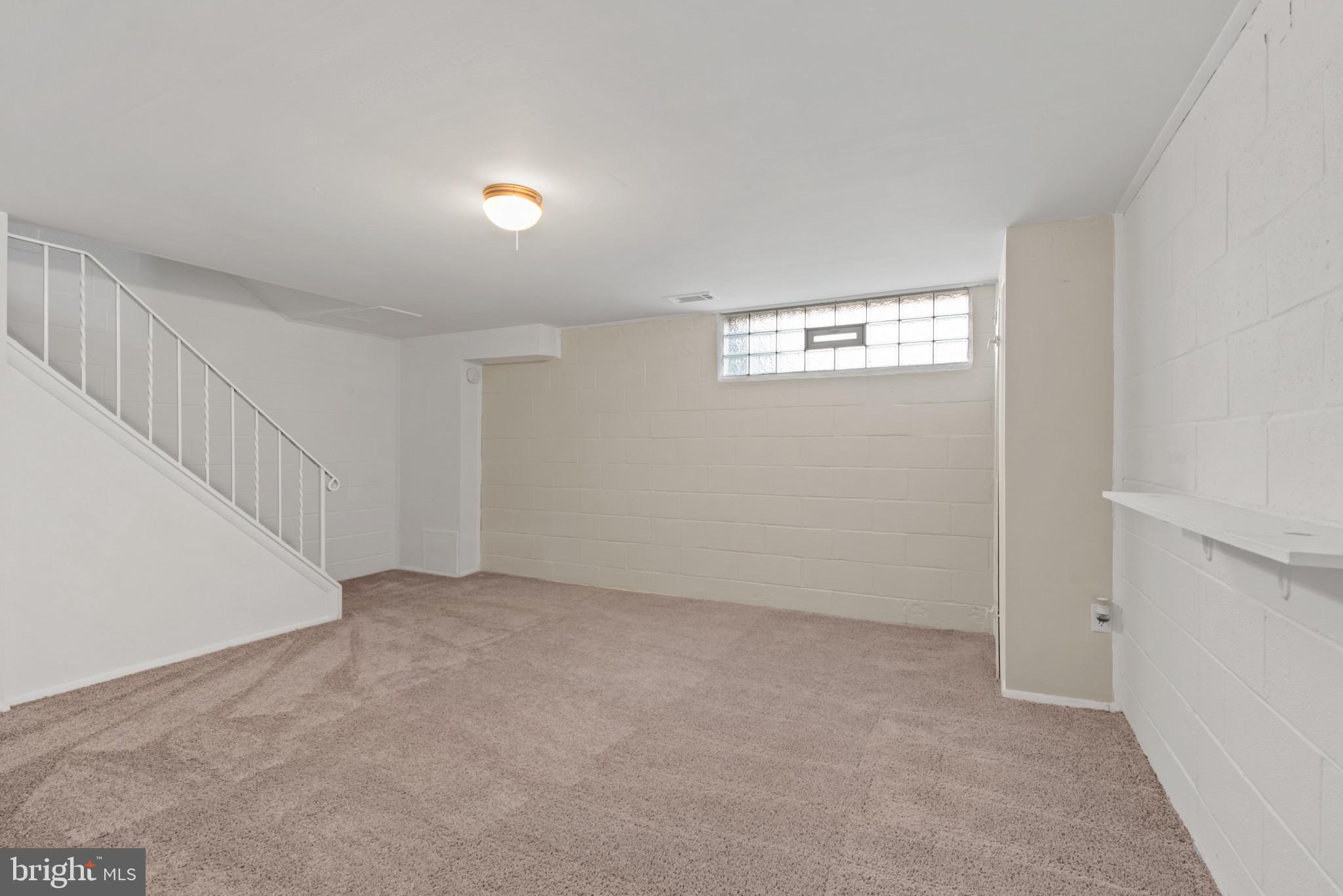4269 Labyrinth Road Baltimore, MD 21215 - Photo 21 of 25 Lower-Level Family Room