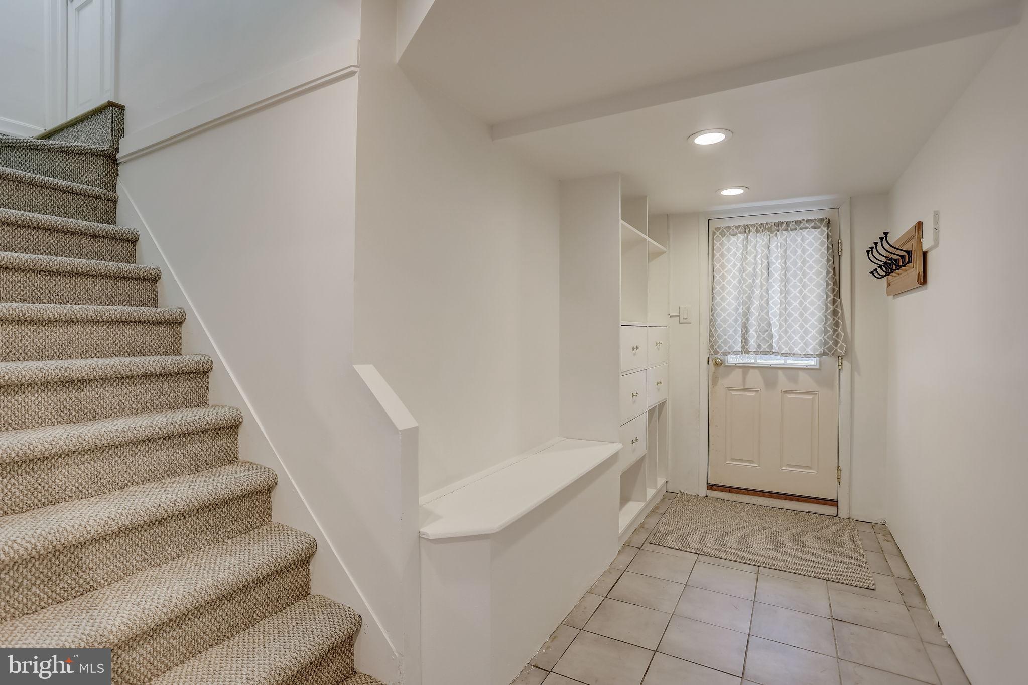 628 Paddock Road Havertown, PA 19083 - Photo 36 of 52 Bsmnt - stairs from the kitchen & door to outside