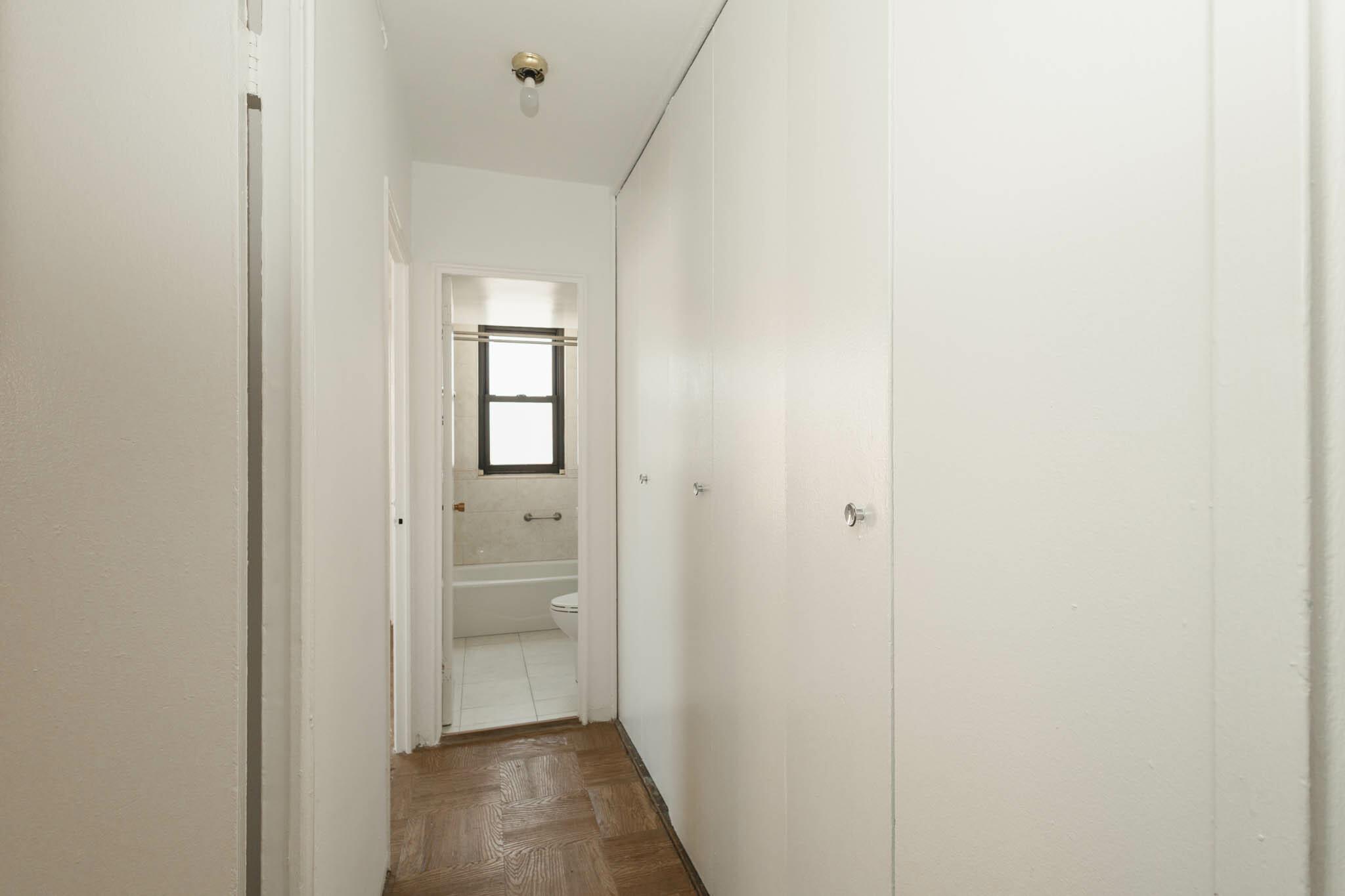 61-25 98th Street, Unit 11E Queens, NY 11374 - Photo 21 of 31 a view of a hallway