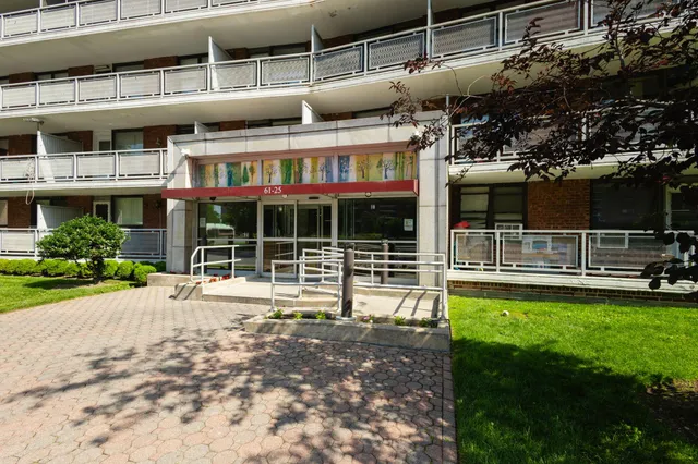 a view of a house with backyard porch and sitting area