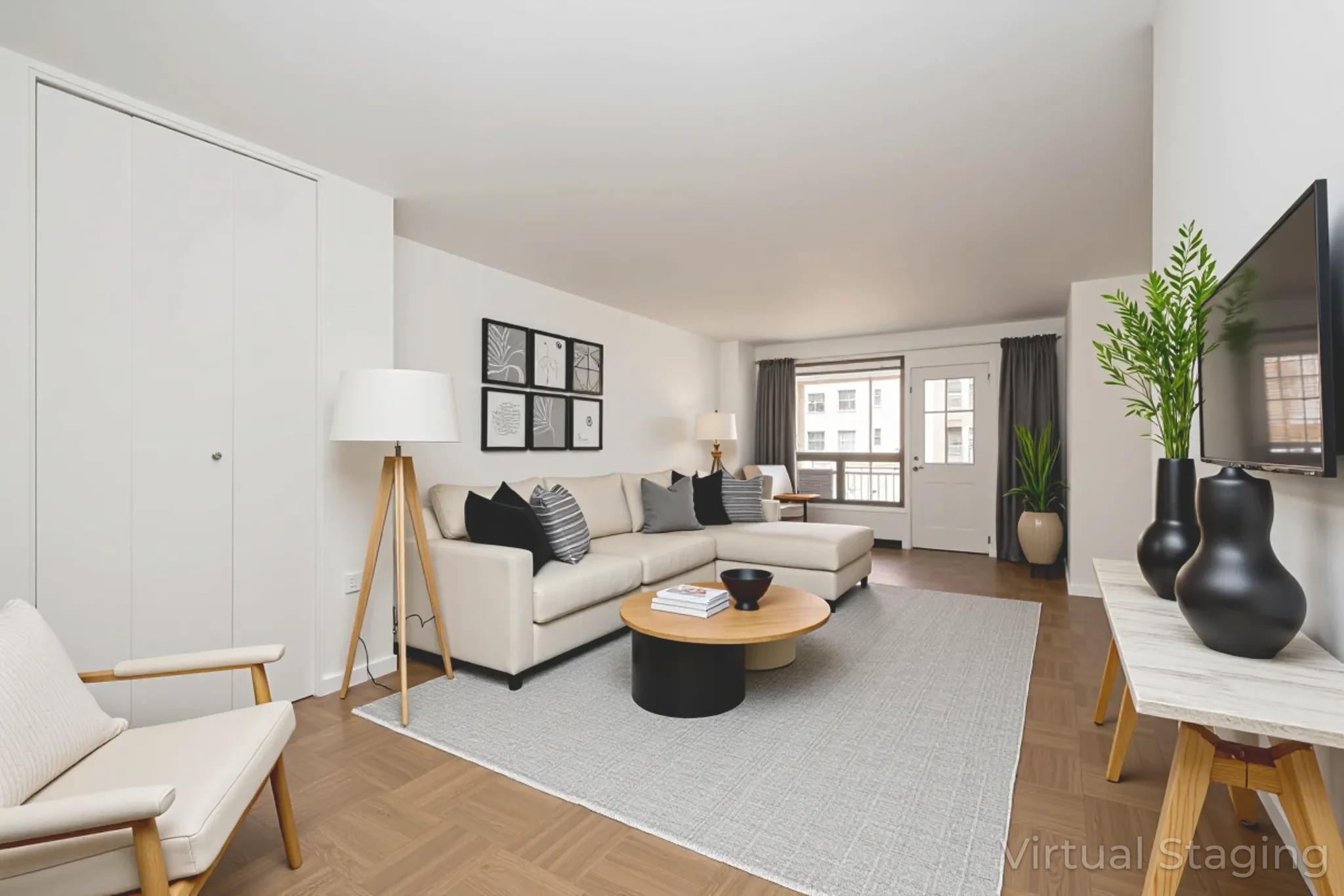 61-25 98th Street, Unit 11E Queens, NY 11374 - Photo 4 of 31 a living room with furniture a flat screen tv and a window