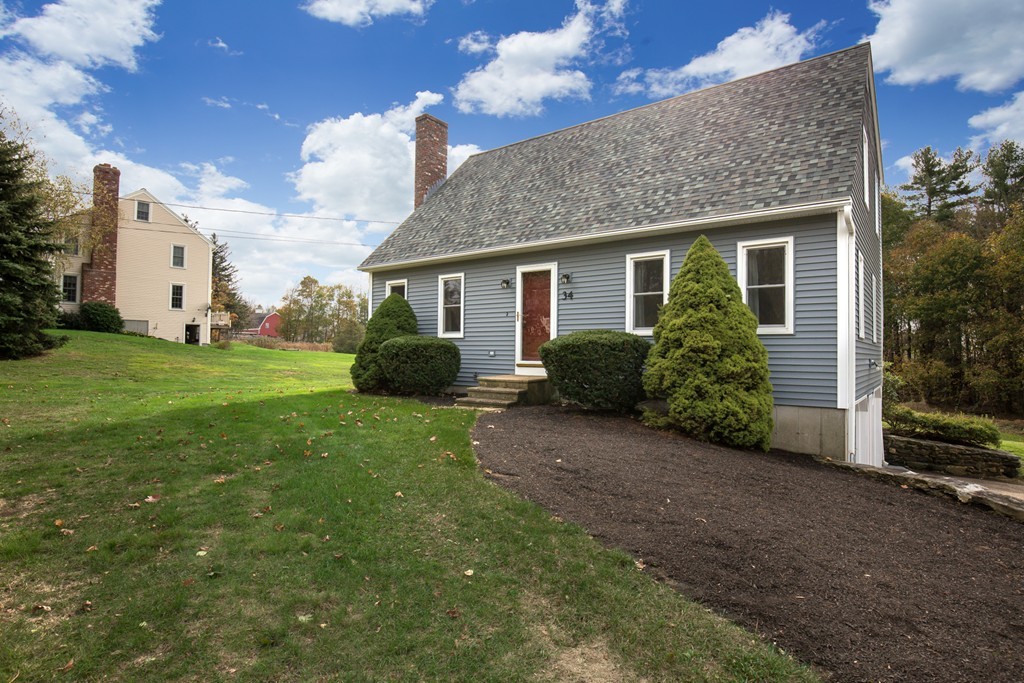 34 Central Tree Road Rutland, MA 01543 - Photo 1 of 30 a view of a house with backyard and garden
