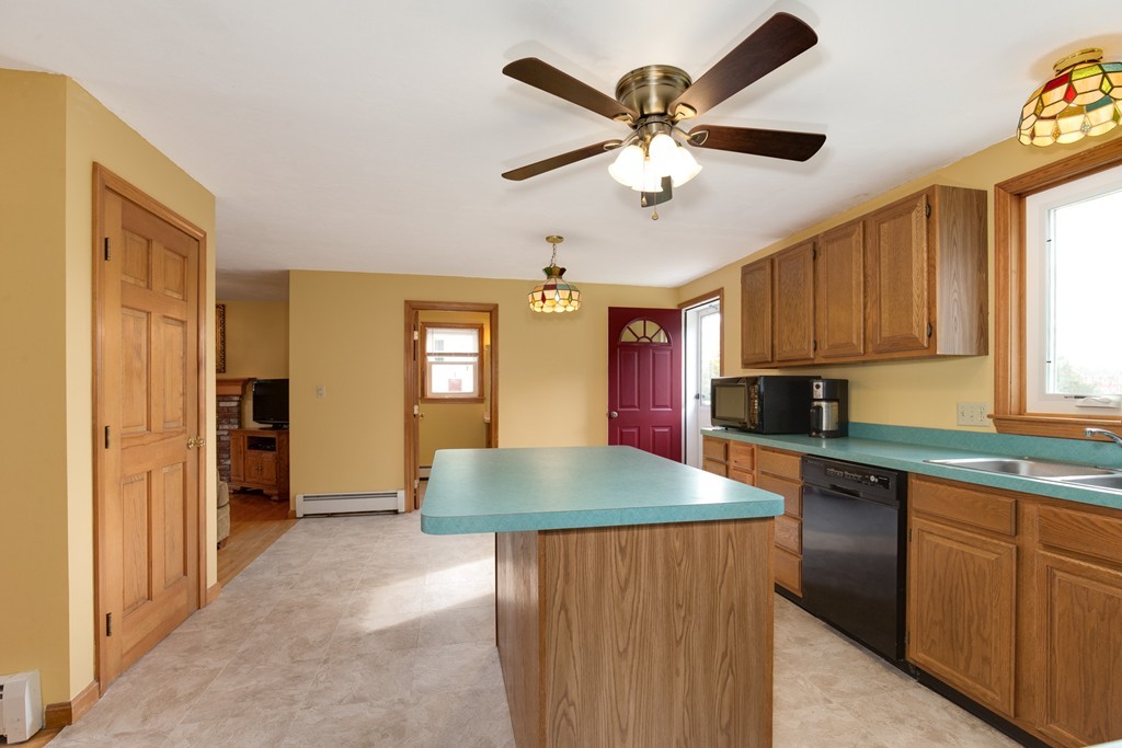 34 Central Tree Road Rutland, MA 01543 - Photo 14 of 30 a kitchen with stainless steel appliances granite countertop a sink stove and refrigerator