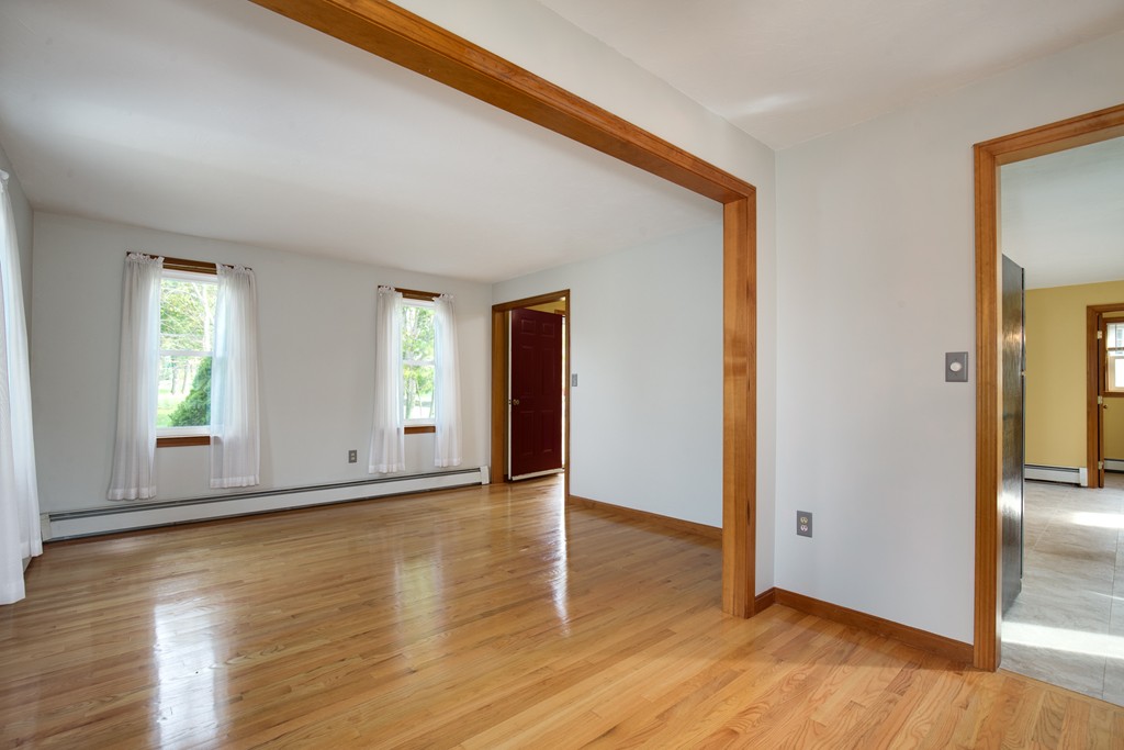 34 Central Tree Road Rutland, MA 01543 - Photo 19 of 30 an empty room with wooden floor and windows