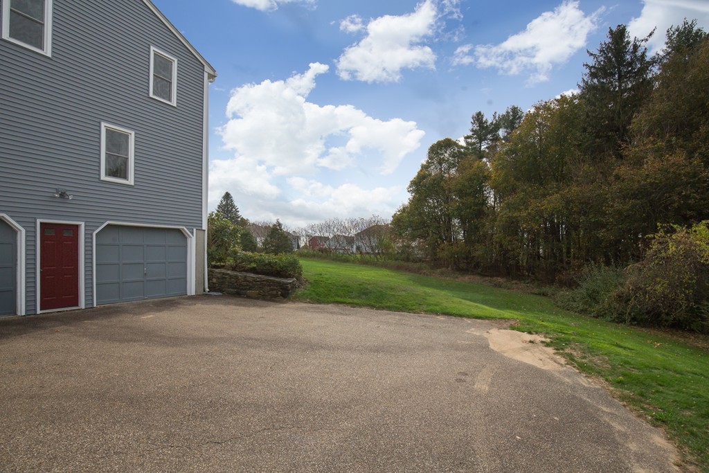 34 Central Tree Road Rutland, MA 01543 - Photo 4 of 30 a view of a house with backyard and garden