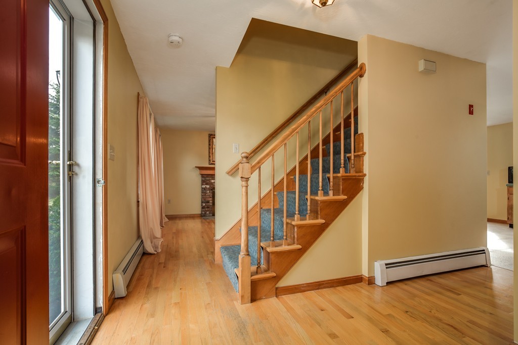 34 Central Tree Road Rutland, MA 01543 - Photo 6 of 30 a view of entryway with wooden floor and stairs