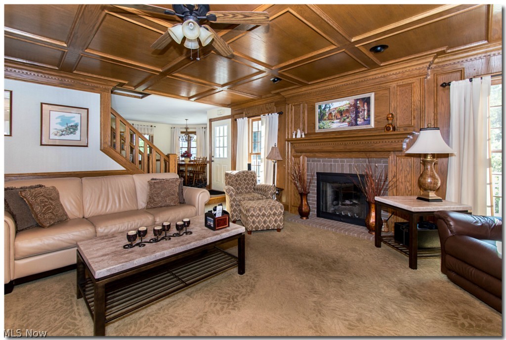 273 Barrington Ridge Road Painesville, OH 44077 - Photo 12 of 25 THE FAMILY ROOM IS WARMED BY THE FINELY CRAFTED CEILING AND FIREPLACE.