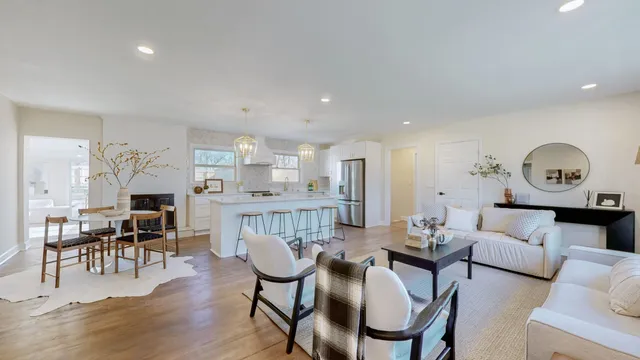 a living room with furniture and a table