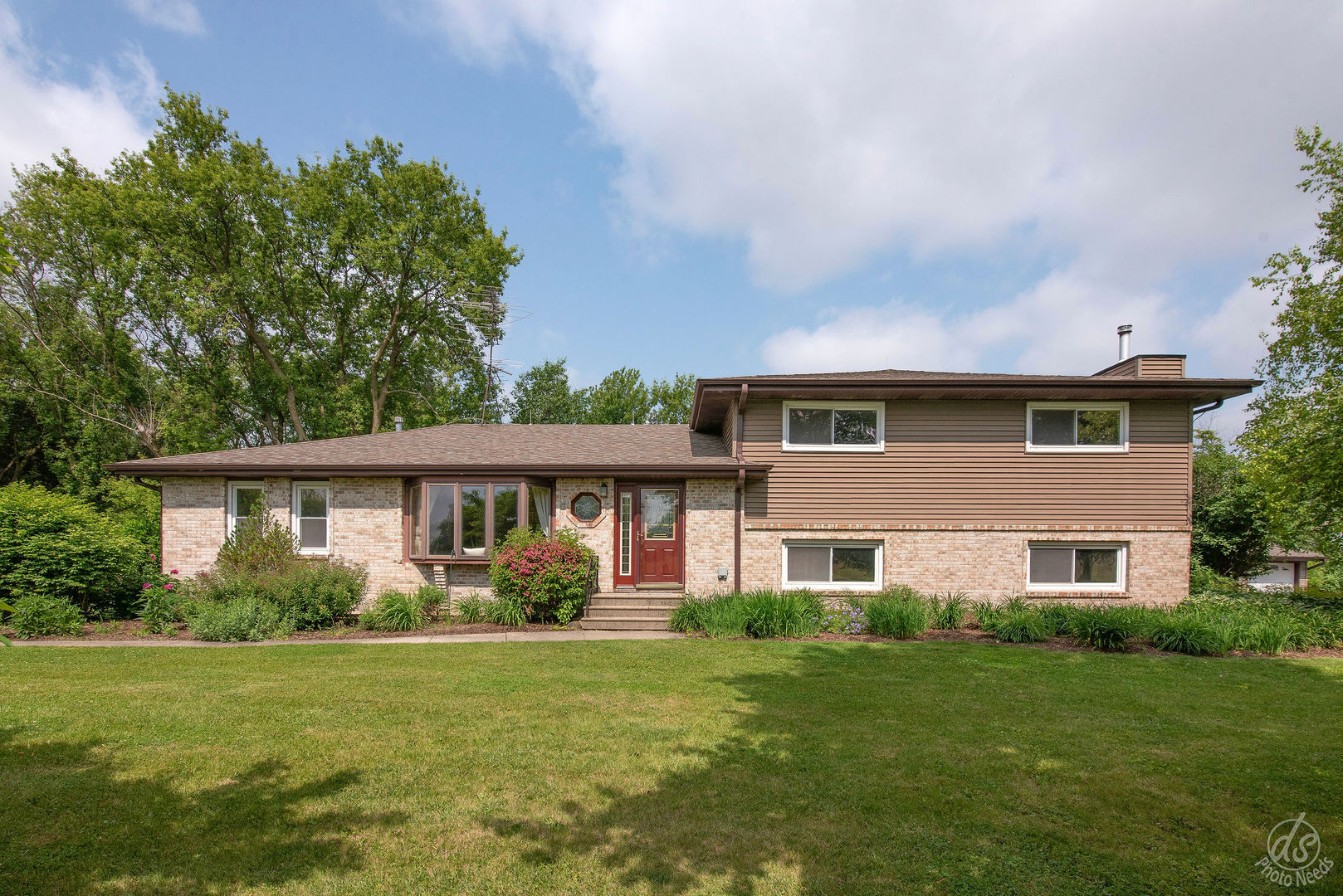 28671 Moose Range Road Sycamore, IL 60178 - Photo 1 of 69 a front view of house with yard and green space