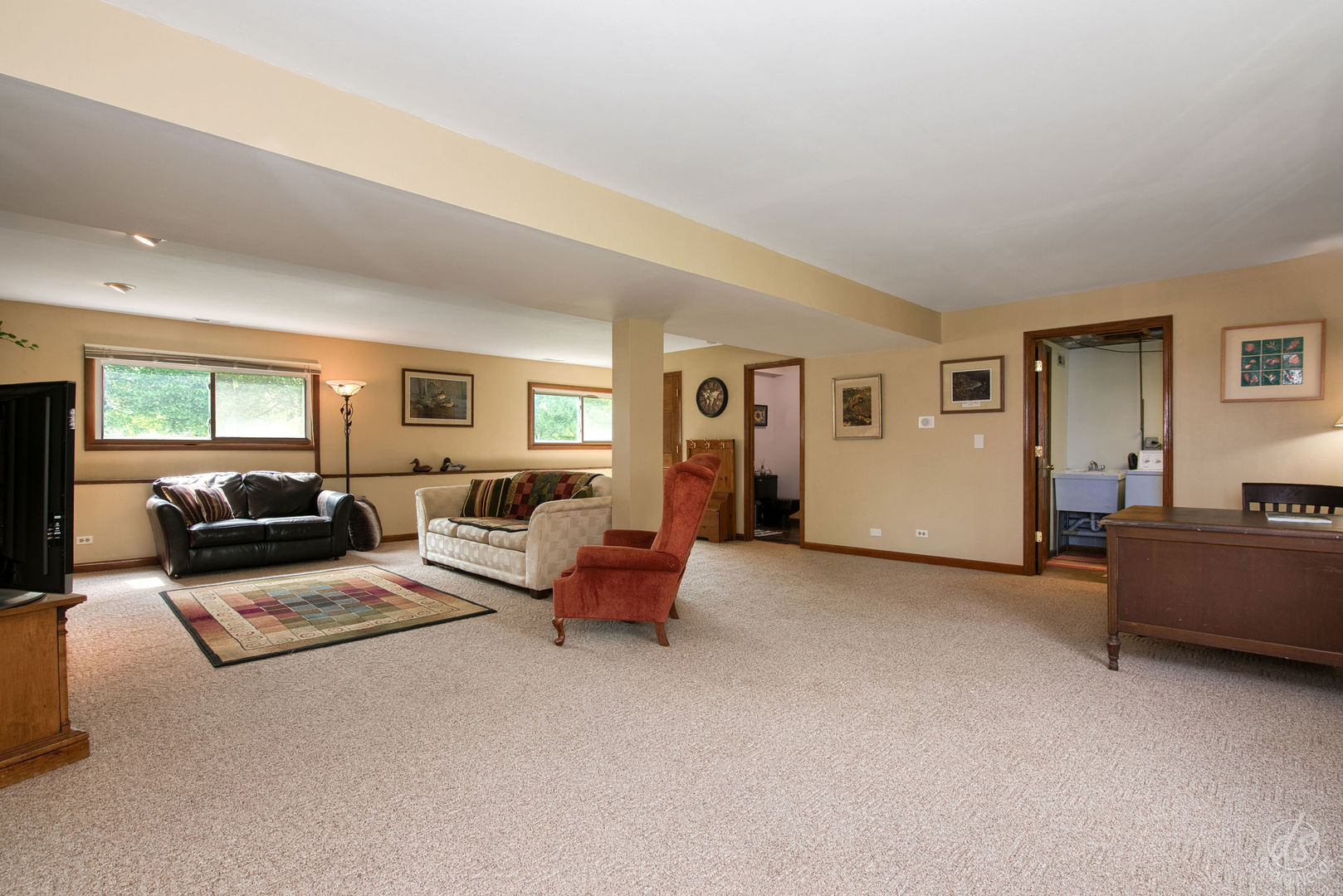 28671 Moose Range Road Sycamore, IL 60178 - Photo 36 of 69 a living room with furniture and a window