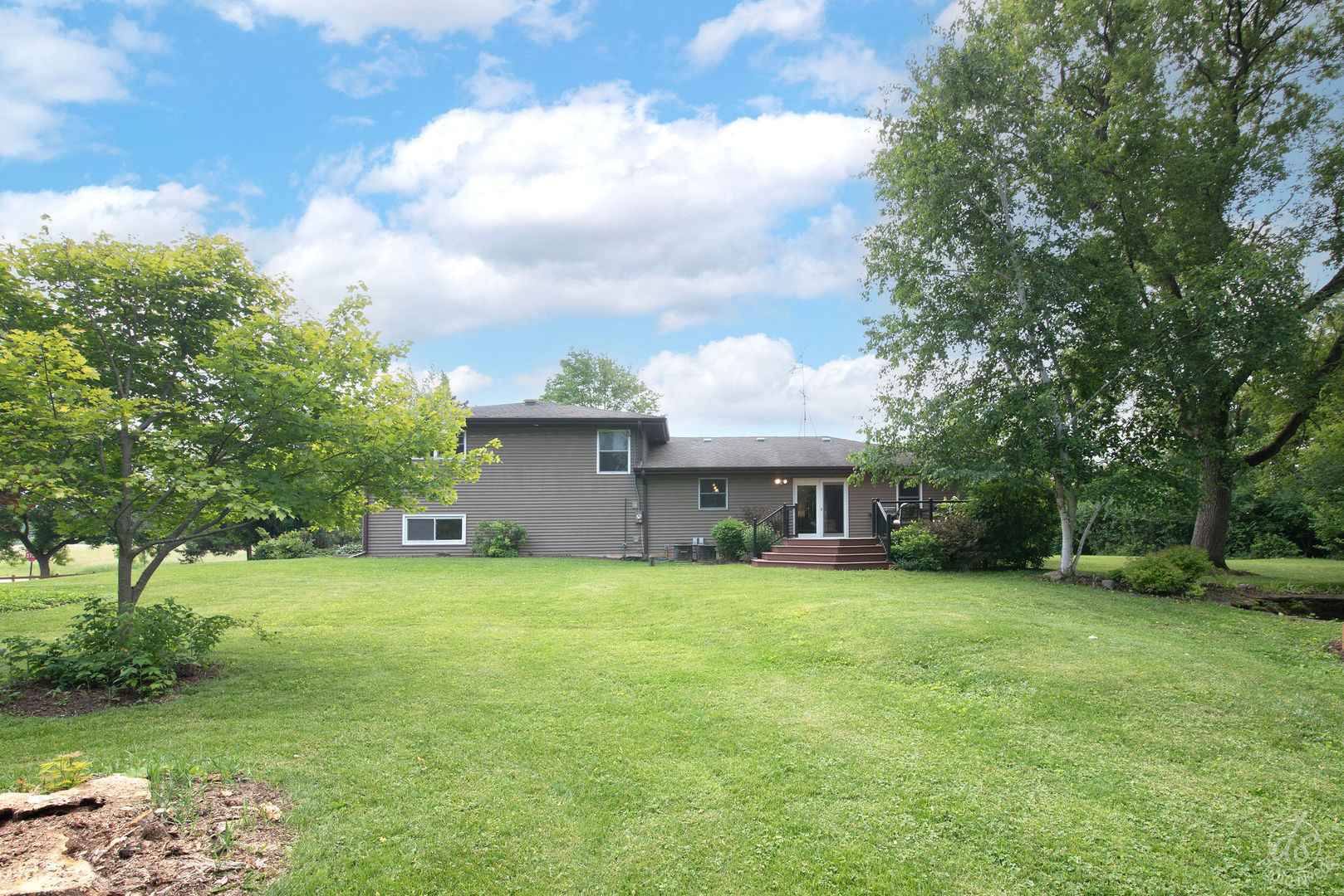 28671 Moose Range Road Sycamore, IL 60178 - Photo 43 of 69 a view of a house with a yard