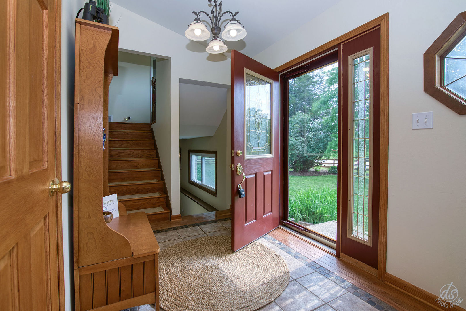 28671 Moose Range Road Sycamore, IL 60178 - Photo 5 of 69 a view of an entryway with wooden floor and door