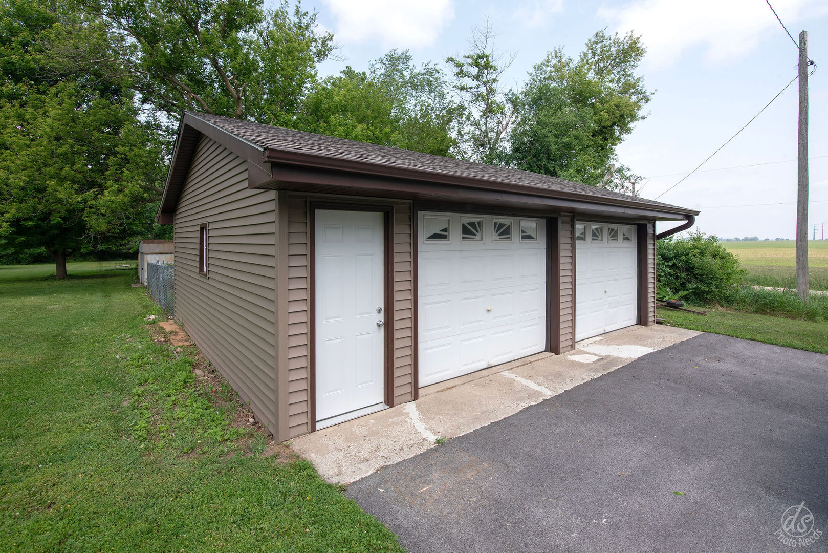 28671 Moose Range Road Sycamore, IL 60178 - Photo 63 of 69 a backyard of a house with lots of green space