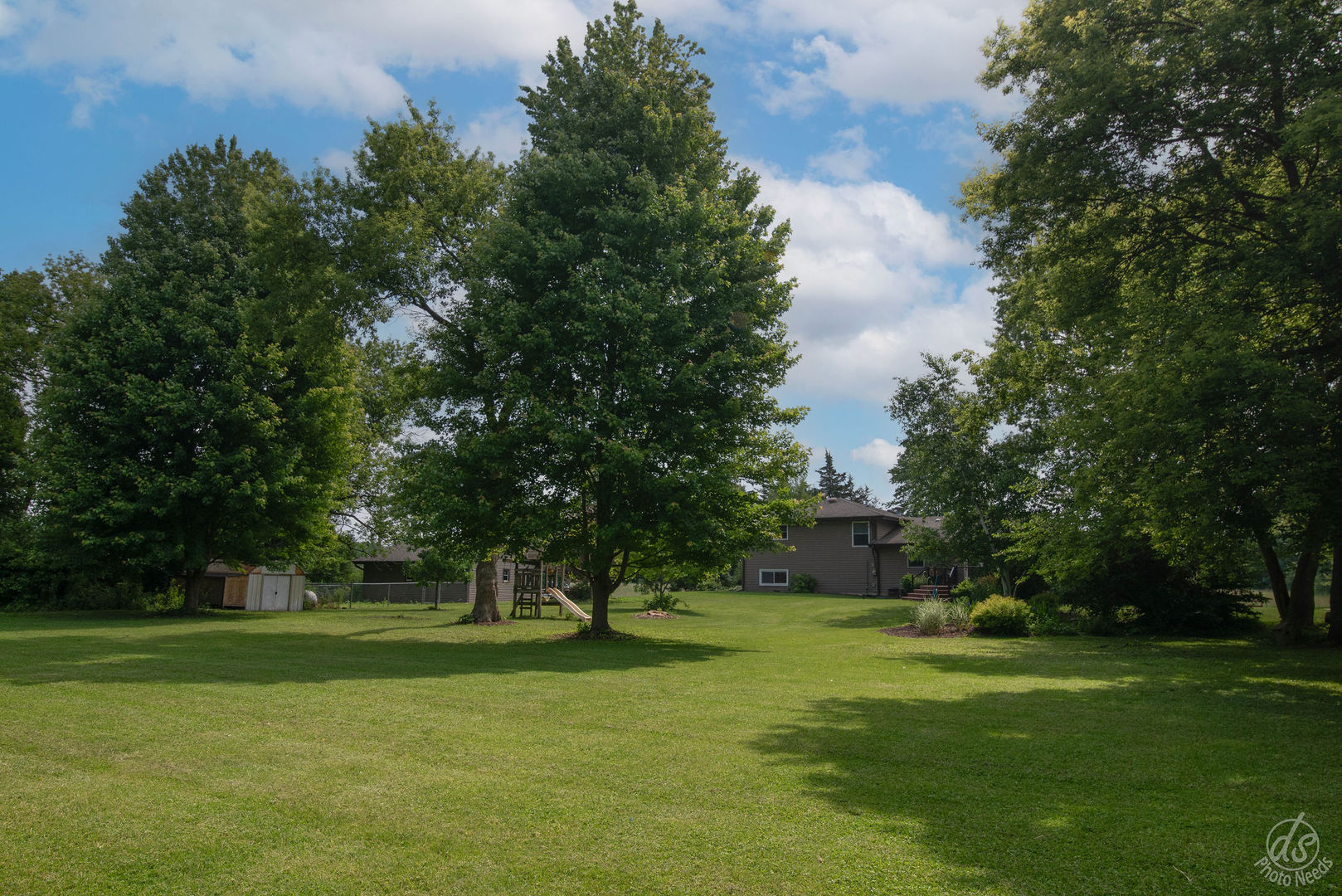 28671 Moose Range Road Sycamore, IL 60178 - Photo 65 of 69 a front view of a house with a yard