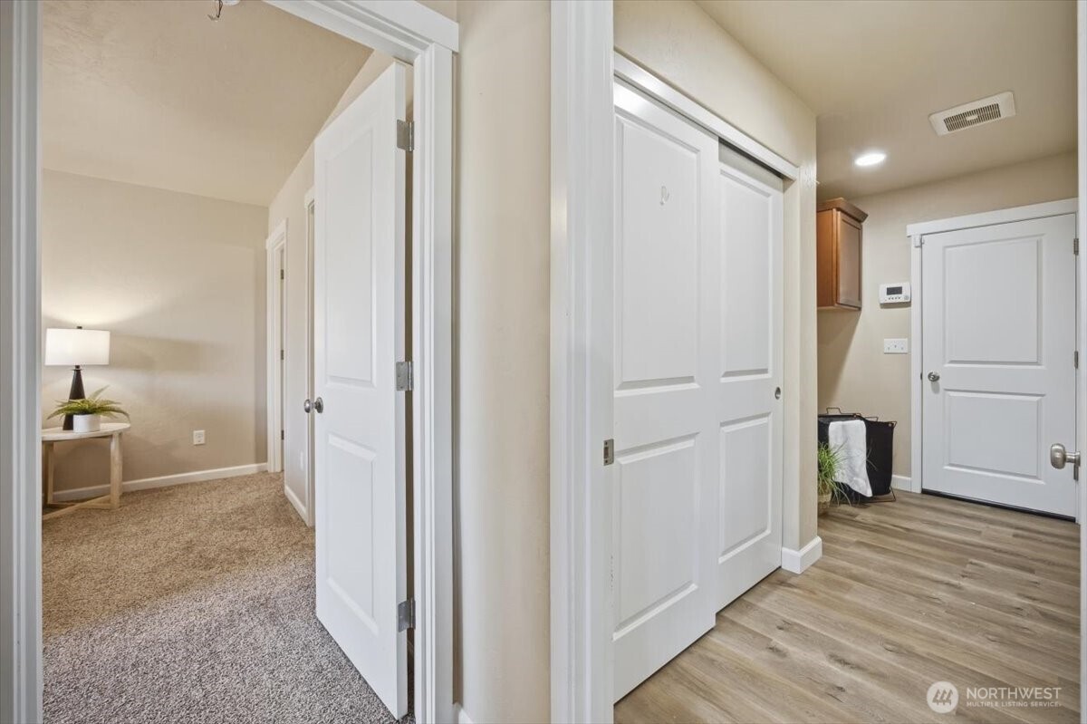 3709 Morehouse Place Pasco, WA 99301 - Photo 19 of 32 a view of a hallway with wooden floor