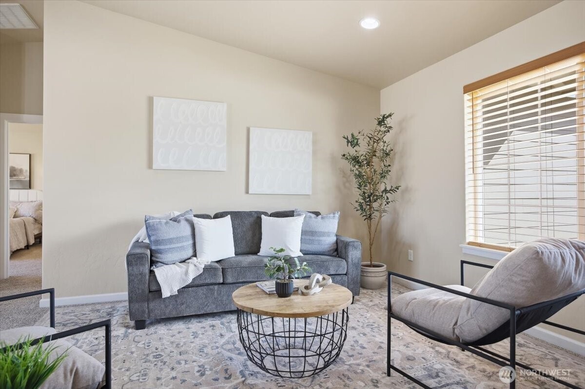 3709 Morehouse Place Pasco, WA 99301 - Photo 5 of 32 a living room with furniture and a potted plant
