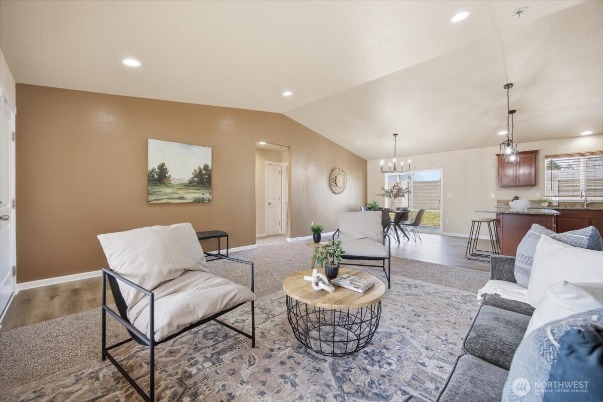 3709 Morehouse Place Pasco, WA 99301 - Photo 7 of 32 a living room with furniture and a table