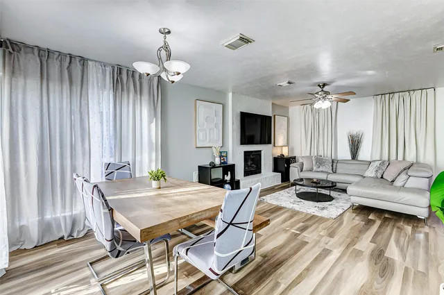 a view of a livingroom with furniture and a window