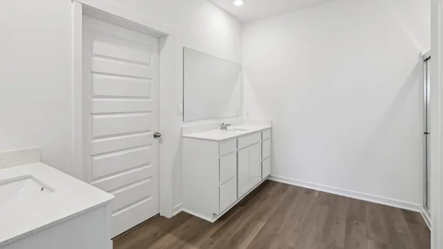 a view of utility room with wooden floor
