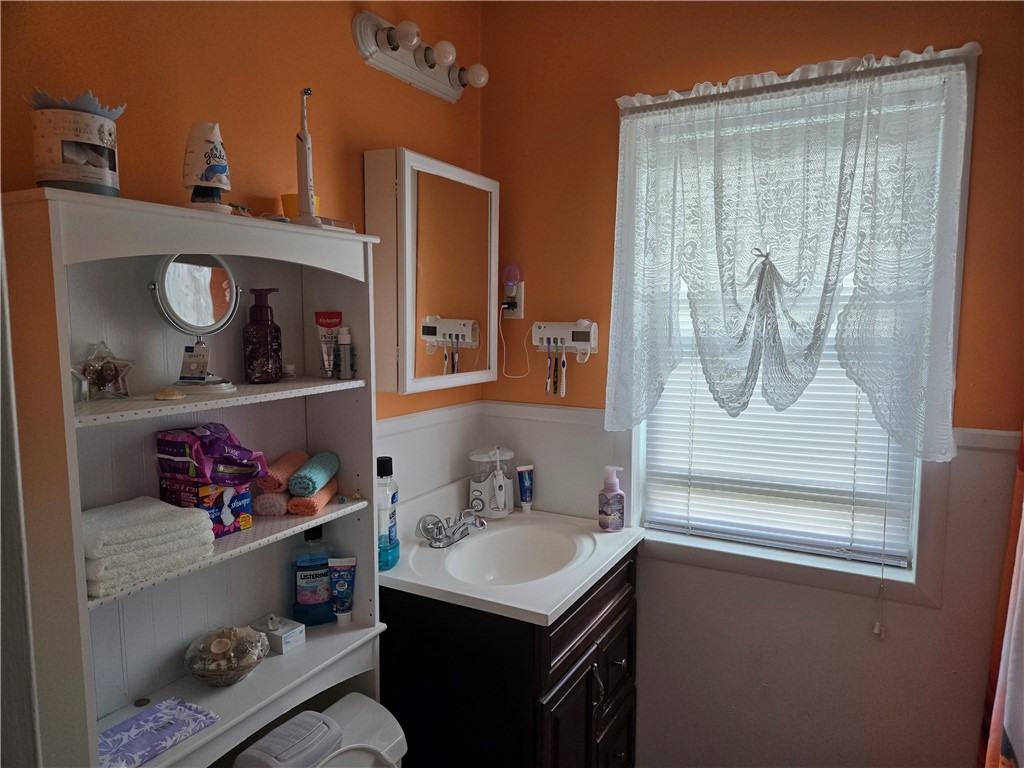 695-697 Culver Road Rochester, NY 14609 - Photo 37 of 50 The full bath here also has a tub/shower surround.