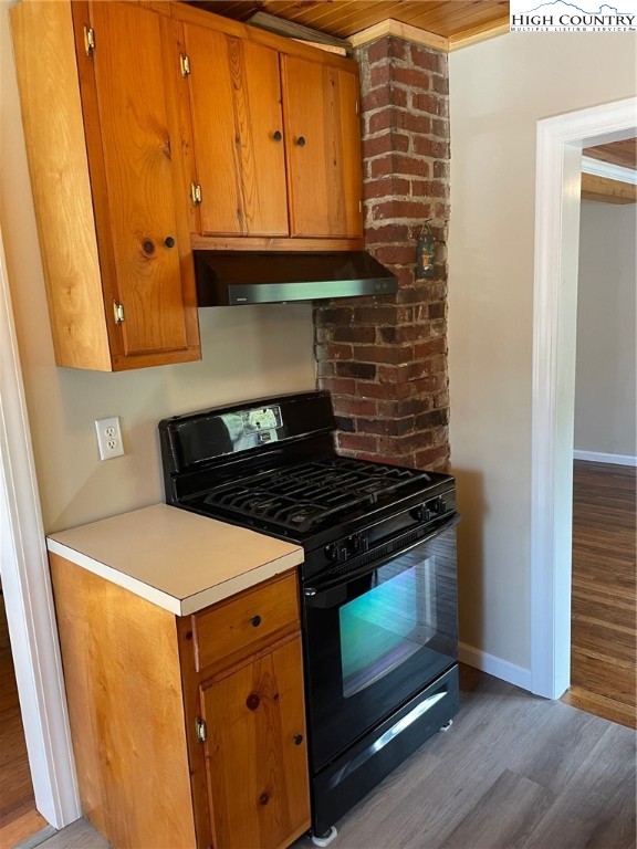 3350 Teaberry Road Lansing, NC 28643 - Photo 23 of 30 a stove top oven sitting inside of a kitchen