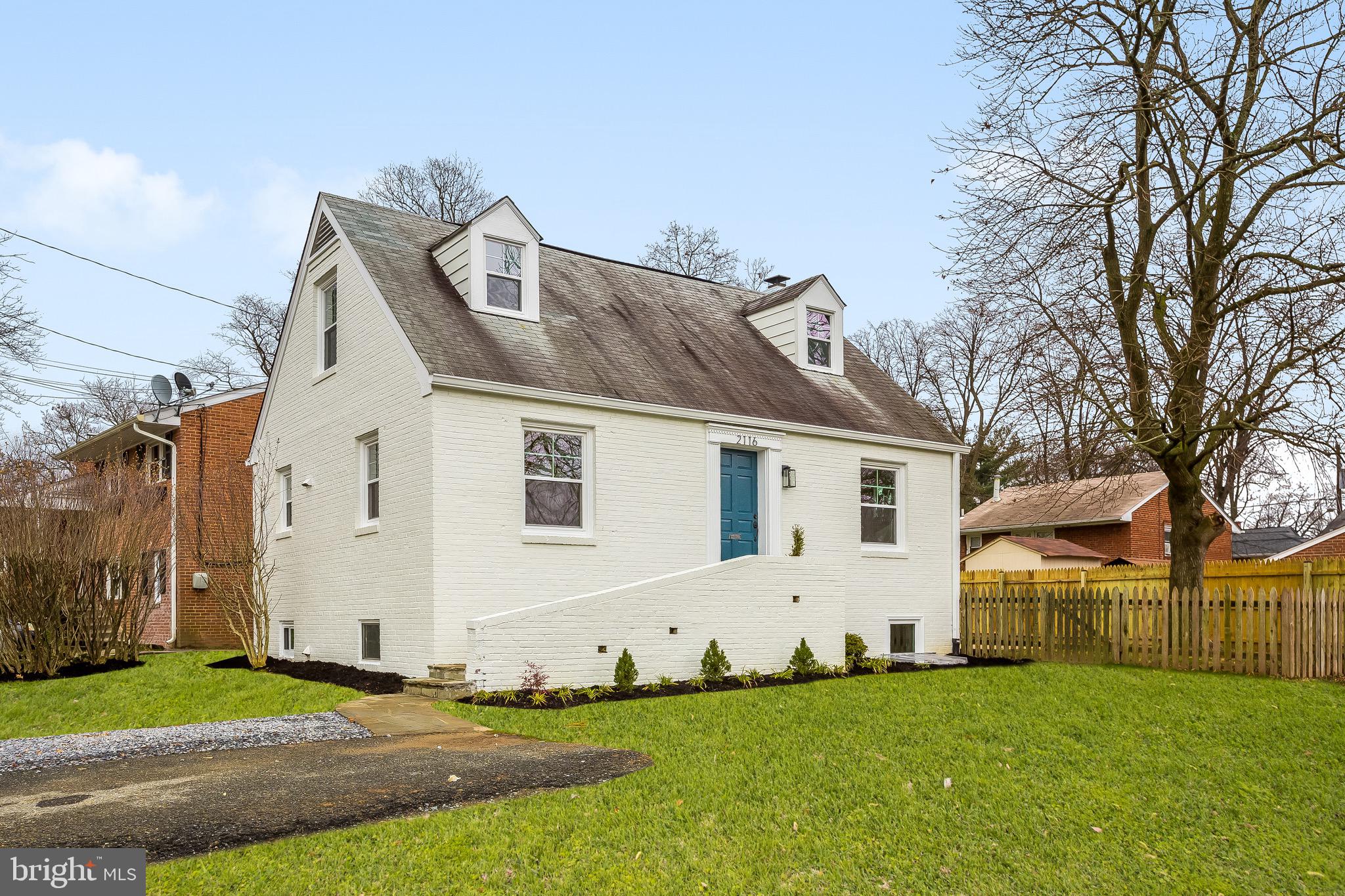 2116 Forest Glen Road Silver Spring, MD 20910 - Photo 2 of 57 a view of a yard in front of a house
