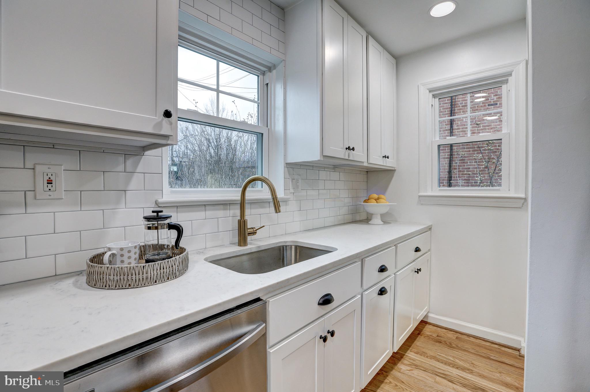 2116 Forest Glen Road Silver Spring, MD 20910 - Photo 17 of 57 a kitchen with sink and window
