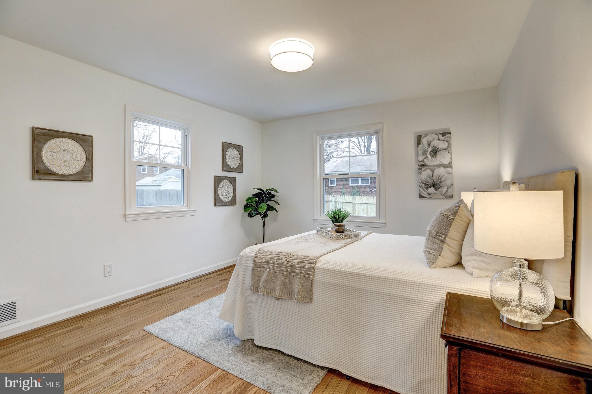 2116 Forest Glen Road Silver Spring, MD 20910 - Photo 21 of 57 a bedroom with a bed and window