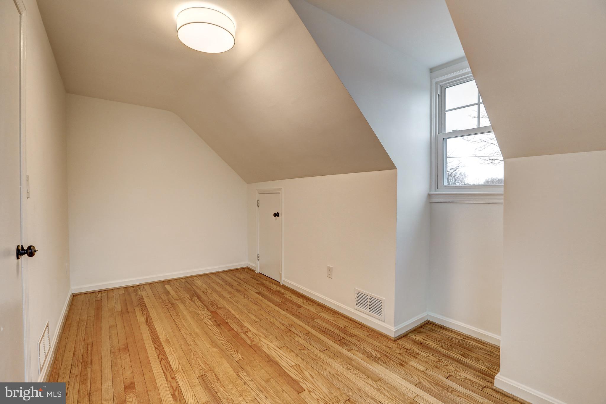 2116 Forest Glen Road Silver Spring, MD 20910 - Photo 31 of 57 an empty room with windows