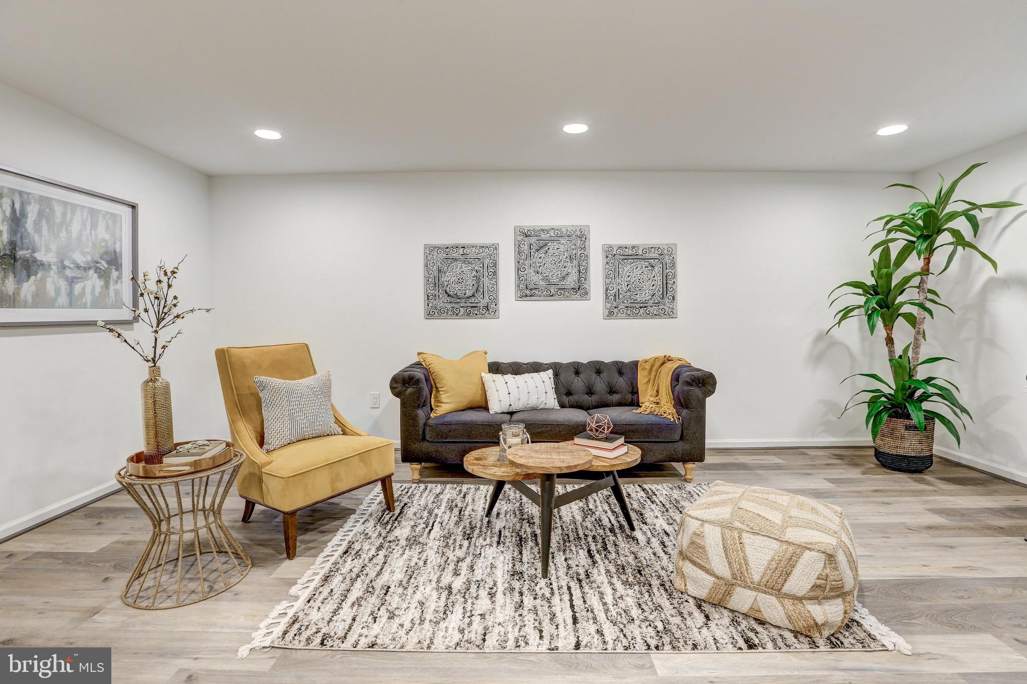 2116 Forest Glen Road Silver Spring, MD 20910 - Photo 41 of 57 a living room with furniture and wooden floor