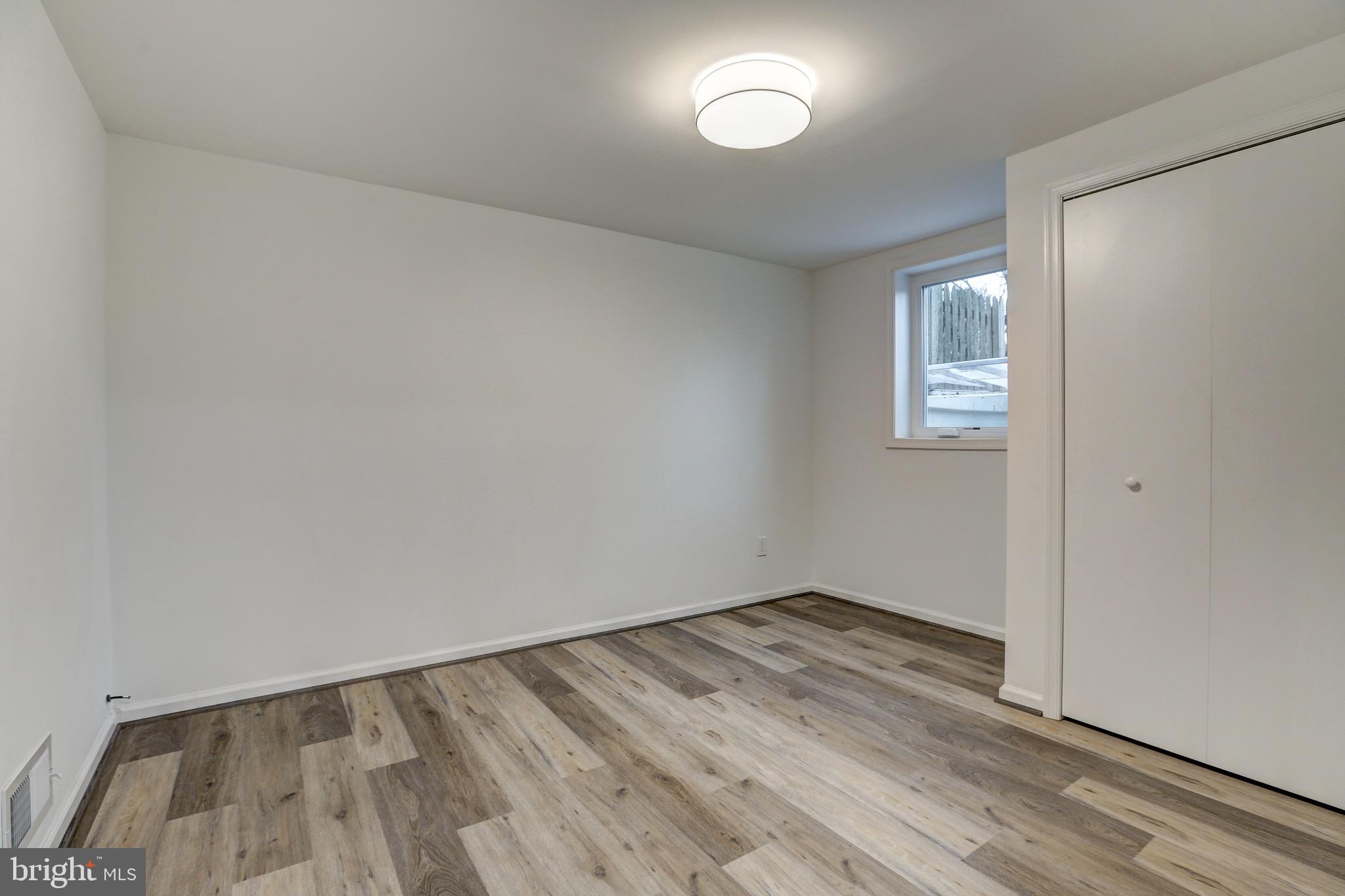 2116 Forest Glen Road Silver Spring, MD 20910 - Photo 45 of 57 wooden floor in an empty room