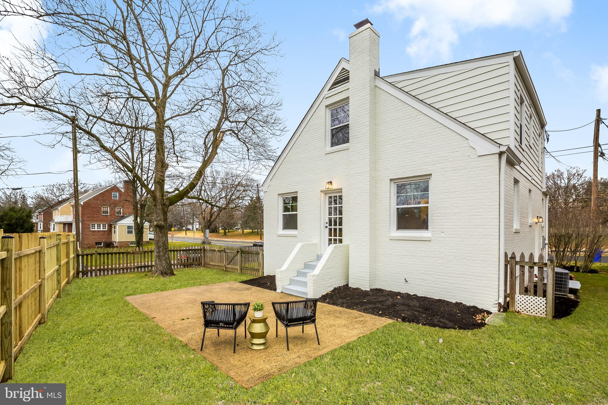 2116 Forest Glen Road Silver Spring, MD 20910 - Photo 53 of 57 a backyard of a house with table and chairs