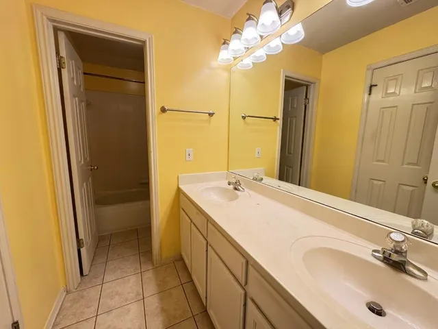 a view of swimming pool with a yard