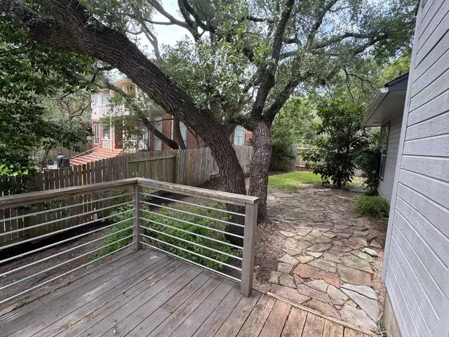 a wooden bench sitting on top of a wooden floor
